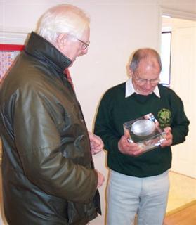 Peter Fuller presents the Bill Alston memorial trophy to turner of the year Howard Overton